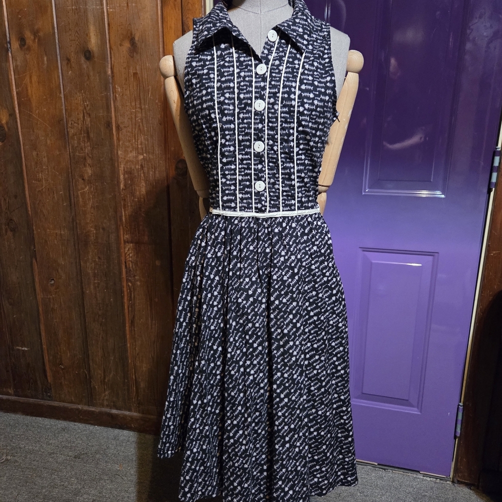 Folter Brand. Fish Bones Pattern. Vintage Style Dress.